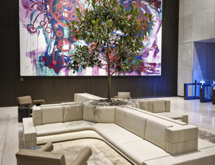 GRC water reservoir planters by Fytogren with lush Ficus trees creating a vibrant, green oasis in the outdoor plaza of Festival Tower Two.