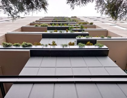 Fytogreen supplied and installed 51.77m² of custom aluminium balcony and suspended façade planter boxes for Fareham Apartments, St Kilda